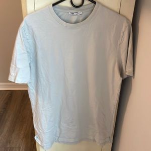 Light gray large tee shirt. Good condition.